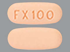 Esto es un Tableta pink-orange oblongo imprimido con FX100 en la parte delantera, nada en la parte posterior, y es fabricado por ALLERGAN INC..