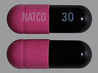 This is a Capsule Dr imprinted with NATCO on the front, 30 on the back.