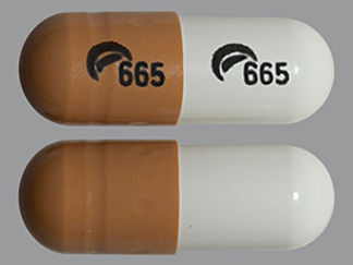 This is a Capsule imprinted with logo and 665 on the front, logo and 665 on the back.