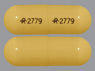 This is a Capsule Er 24hr imprinted with logo and 2779 on the front, logo and 2779 on the back.