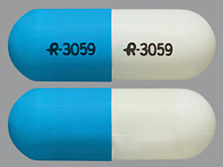 This is a Capsule Er 24 Hr imprinted with logo and 3059 on the front, logo and 3059 on the back.