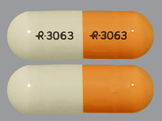 This is a Capsule Er 24 Hr imprinted with logo and 3063 on the front, logo and 3063 on the back.
