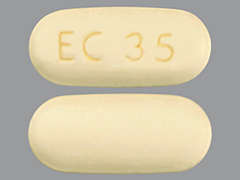 Esto es un Tableta LP amarillo oval imprimido con EC 35 en la parte delantera, nada en la parte posterior, y es fabricado por GREENSTONE/MYLA.
