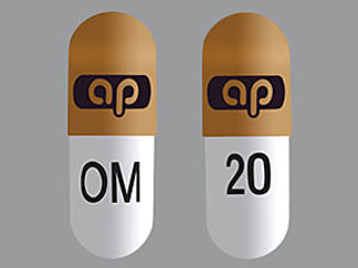 This is a Capsule imprinted with logo on the front, OM 20 on the back.