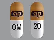 Omeprazole-Sodium Bicarbonate: This is a Capsule imprinted with logo on the front, OM 20 on the back.