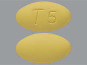 Tadalafil: This is a light yellow oval Tablet imprinted with T 5 on the front, nothing on the back, and is manufactured by AJANTA PHARMA L.