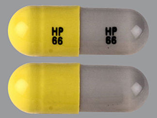 This is a Capsule imprinted with HP  66 on the front, HP  66 on the back.