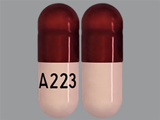 This is a Capsule imprinted with A 223 on the front, nothing on the back.