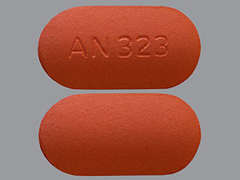 Esto es un Tableta LP 24 Hr naranja oblongo imprimido con AN 323 en la parte delantera, nada en la parte posterior, y es fabricado por MARLEX PHARM..