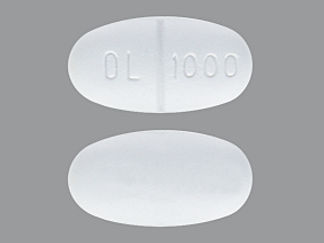 This is a Tablet imprinted with OL 1000 on the front, nothing on the back.