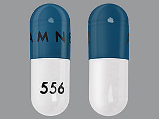 This is a Capsule imprinted with AMNEAL on the front, 556 on the back.