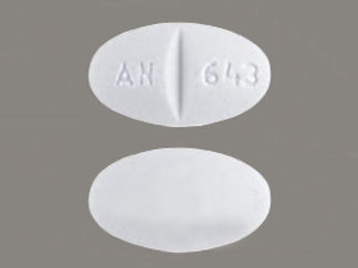 This is a Tablet imprinted with AN  643 on the front, nothing on the back.