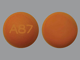 This is a Capsule imprinted with A87 on the front, nothing on the back.