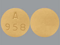 This is a Tablet Er 24 Hr imprinted with A  958 on the front, nothing on the back.