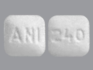 Esto es un Tableta imprimido con ANI en la parte delantera, 240 en la parte posterior, y es fabricado por None.