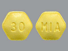 This is a light yellow hexagonal Tablet imprinted with 30 on the front, MIA on the back, and is manufactured by WILSHIRE PHARMA.