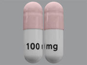 Temozolomide: This is a Capsule imprinted with 100 mg on the front, nothing on the back.