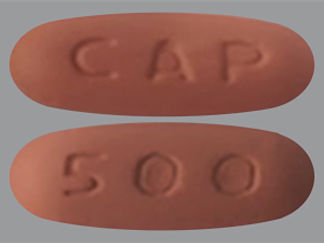 This is a Tablet imprinted with CAP on the front, 500 on the back.
