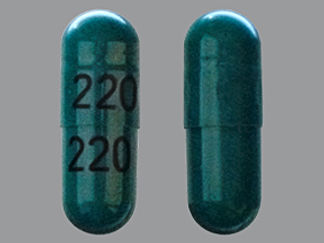This is a Capsule imprinted with 220 on the front, 220 on the back.