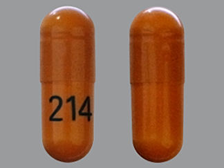 This is a Capsule imprinted with 214 on the front, nothing on the back.