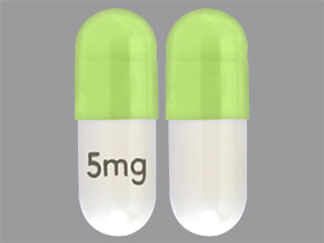 This is a Capsule imprinted with 5mg on the front, nothing on the back.