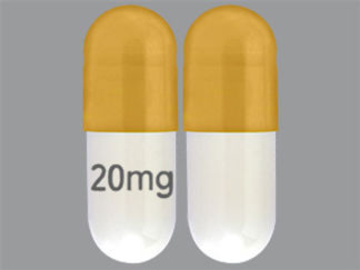 This is a Capsule imprinted with 20mg on the front, nothing on the back.