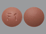 Finasteride: Esto es un Tableta imprimido con F1 en la parte delantera, nada en la parte posterior, y es fabricado por None.