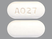 Ezetimibe-Simvastatin: This is a Tablet imprinted with A027 on the front, nothing on the back.