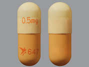Astagraf Xl: Esto es un Cápsula LP 24 Hr naranja oblongo imprimido con 0.5 mg en la parte delantera, logo and 647 en la parte posterior, y es fabricado por ASTELLAS PHARMA.