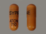 Syprine: Esto es un Cápsula imprimido con SYPRINE en la parte delantera, ATON  710 en la parte posterior, y es fabricado por None.