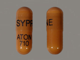 This is a Capsule imprinted with SYPRINE on the front, ATON  710 on the back.