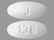 Fenofibrate: This is a Tablet imprinted with J on the front, 136 on the back.