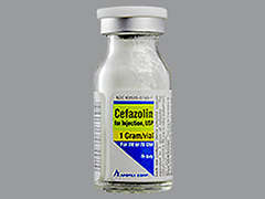 This is a white Vial imprinted with nothing on the front, nothing on the back, and is manufactured by APOTEX CORP.