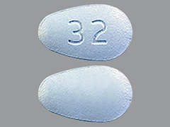This is a blue almond Tablet imprinted with 32 on the front, nothing on the back, and is manufactured by QUINN-FPP.