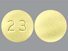 Esto es un Tableta amarillo claro redondo imprimido con 23 en la parte delantera, nada en la parte posterior, y es fabricado por APOTEX CORP.