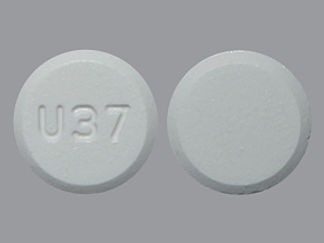 This is a Tablet imprinted with U37 on the front, nothing on the back.