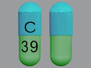 Clindamycin Hcl: Esto es un Cápsula imprimido con C en la parte delantera, 39 en la parte posterior, y es fabricado por None.