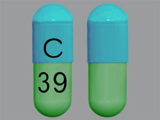 This is a Capsule imprinted with C on the front, 39 on the back.