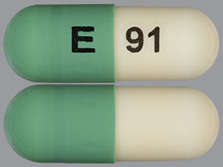 This is a Capsule imprinted with E on the front, 91 on the back.