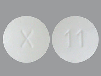 This is a Tablet imprinted with X on the front, 11 on the back.