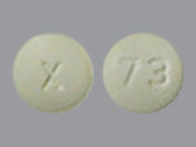 Alprazolam Er: This is a Tablet Er 24 Hr imprinted with x on the front, 73 on the back.