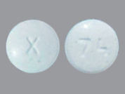 Alprazolam Er: This is a Tablet Er 24 Hr imprinted with X on the front, 74 on the back.