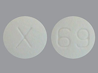 Esto es un Tableta imprimido con X en la parte delantera, 69 en la parte posterior, y es fabricado por None.