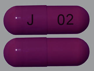 This is a Capsule imprinted with J on the front, 02 on the back.