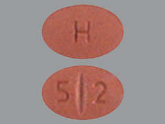 Esto es un Tableta color café oval imprimido con 5 2 en la parte delantera, H en la parte posterior, y es fabricado por AUROBINDO PHARM.