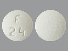 This is a Tablet Disintegrating imprinted with F  24 on the front, nothing on the back.