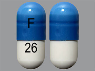 This is a Capsule imprinted with F on the front, 26 on the back.