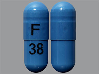 This is a Capsule imprinted with F on the front, 38 on the back.