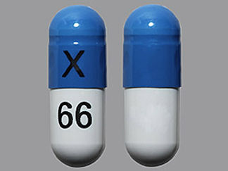 This is a Capsule imprinted with X on the front, 66 on the back.