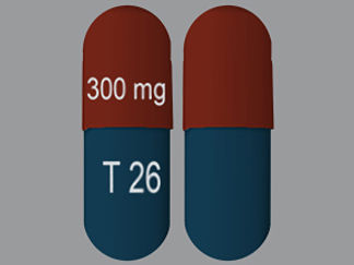 Esto es un Cápsula imprimido con 300 mg en la parte delantera, T 26 en la parte posterior, y es fabricado por None.